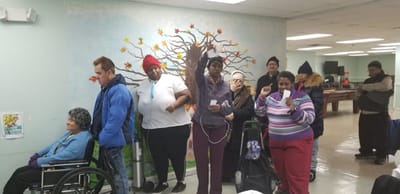 Residents participating in an activity in the common area