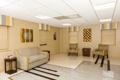 A cozy lobby area with seating and decor