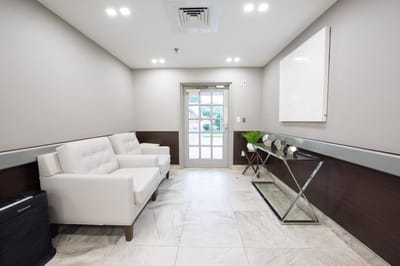 Bright, modern interior lobby with seating area