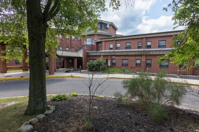 Exterior view of Aspen Hills Healthcare Center entrance