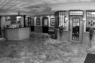 Reception area with front desk and plants
