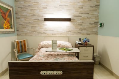 A private room with a bed and decor