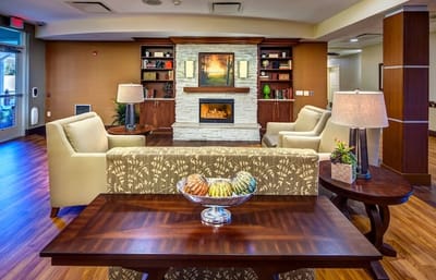 Cozy common area with seating and fireplace