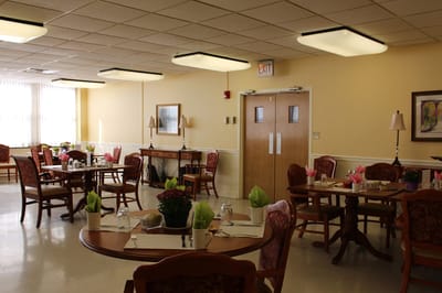 Dining area with tables set for meals