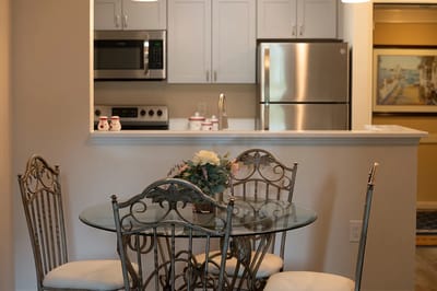 Cozy dining space with a table and kitchen view