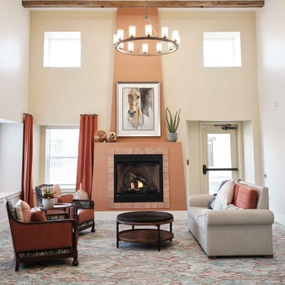 Cozy interior lounge with a fireplace and seating