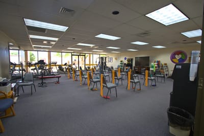 Interior view of a fitness room with exercise equipment