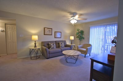 Cozy living room area with seating and natural light