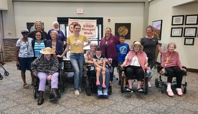 Residents and staff participating in a community event