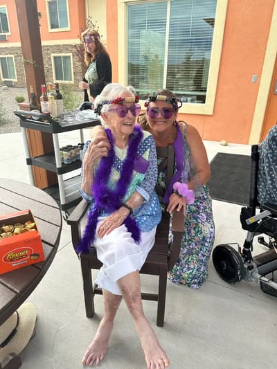 Residents celebrating outdoors with decorations