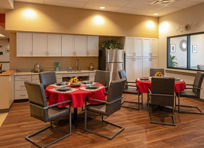 Bright dining room with tables set for a meal