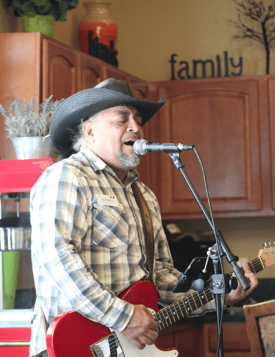 Musician performing in a facility common area