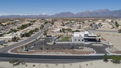 Aerial view of the assisted living facility with surrounding area