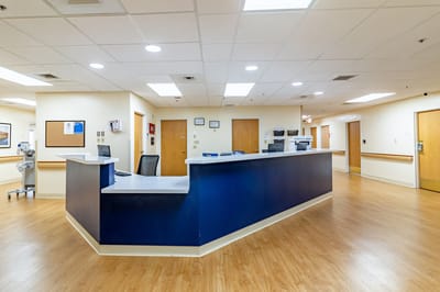 Reception area of a nursing facility with a front desk