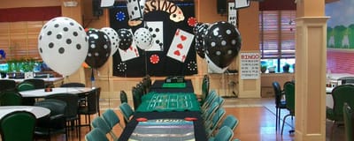 Bingo game setup with balloons and decorations