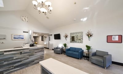 Reception area with seating and decorative elements