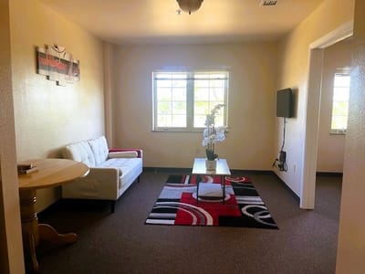 Bright interior room with a couch and table