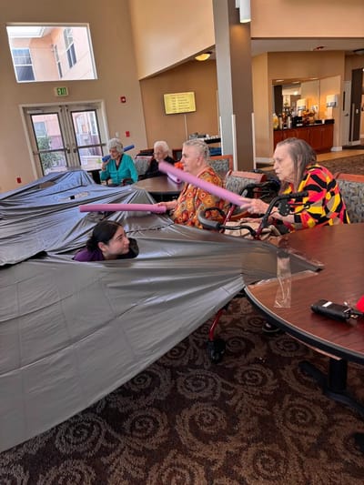 Residents enjoying a fun activity in a common area