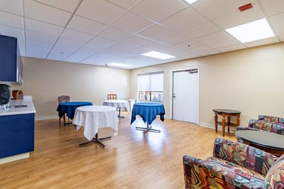 Bright common area with tables and chairs