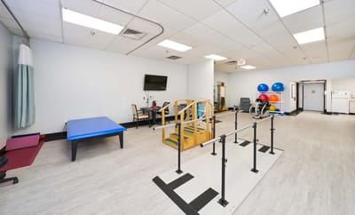 Rehabilitation therapy room with exercise equipment
