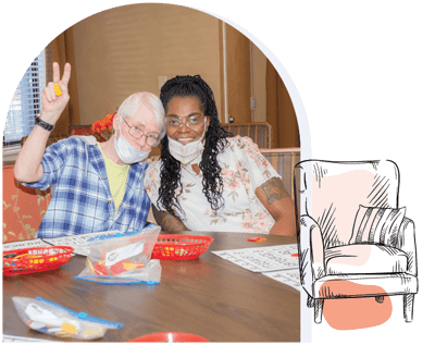 Residents playing bingo together in an activity room