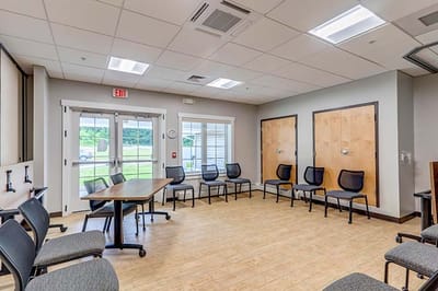 Interior meeting room with chairs and a table