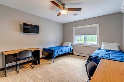 Interior view of a resident room with two beds