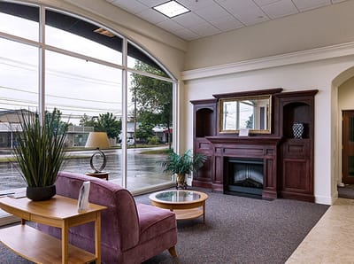 Bright common area with seating and plants