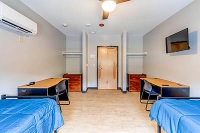 Interior view of a shared resident room with twin beds
