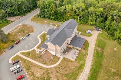 Aerial view of the facility building and surrounding area