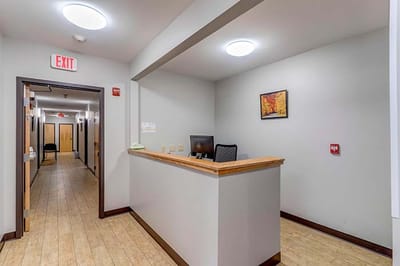 Reception area of a nursing home facility with a hallway