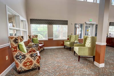 Cozy interior seating area with patterned chairs