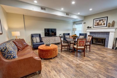 Cozy common area with seating and a fireplace