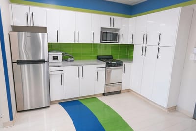 Bright kitchen area with modern appliances