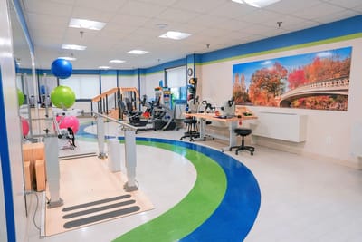 Rehabilitation center interior with exercise equipment