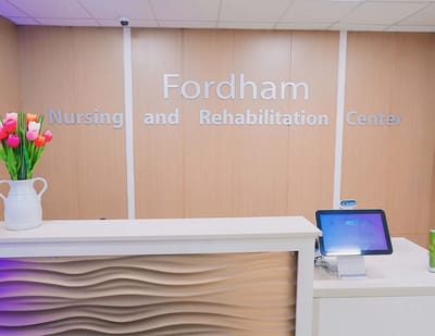 Reception area with branding for Fordham Nursing and Rehabilitation Center
