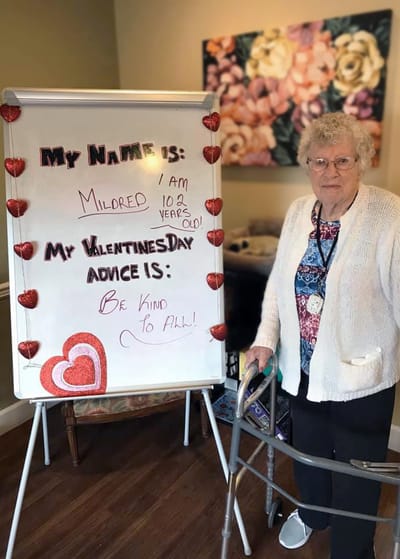 Resident sharing Valentine's Day advice in common area