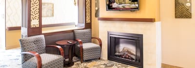 Cozy common area with fireplace and seating