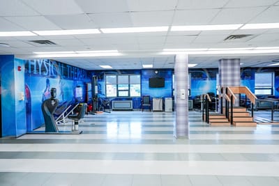Interior view of a physical therapy room with equipment
