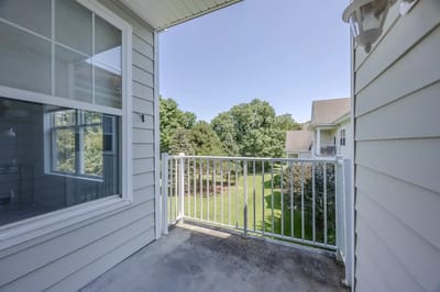 Balcony view overlooking landscaped gardens
