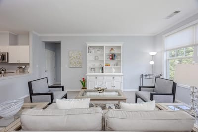 Bright common area with comfortable seating and decor