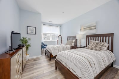 Cozy twin bedroom with modern furnishings