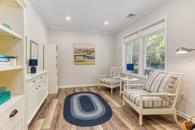 Bright and inviting sitting area with cozy chairs