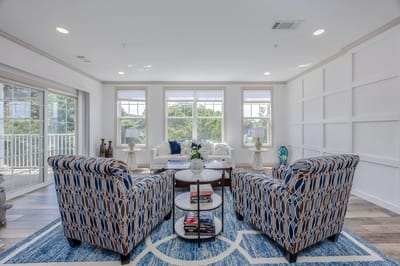 Bright common area with seating and natural light