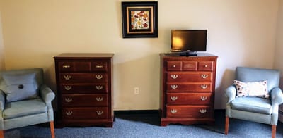 Interior view of a resident's room with furniture