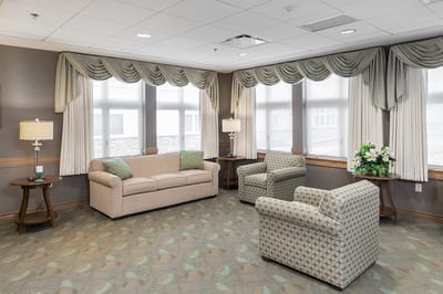 Comfortable common area with seating and natural light