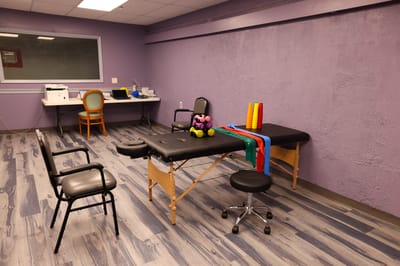 Interior view of a therapy room with equipment