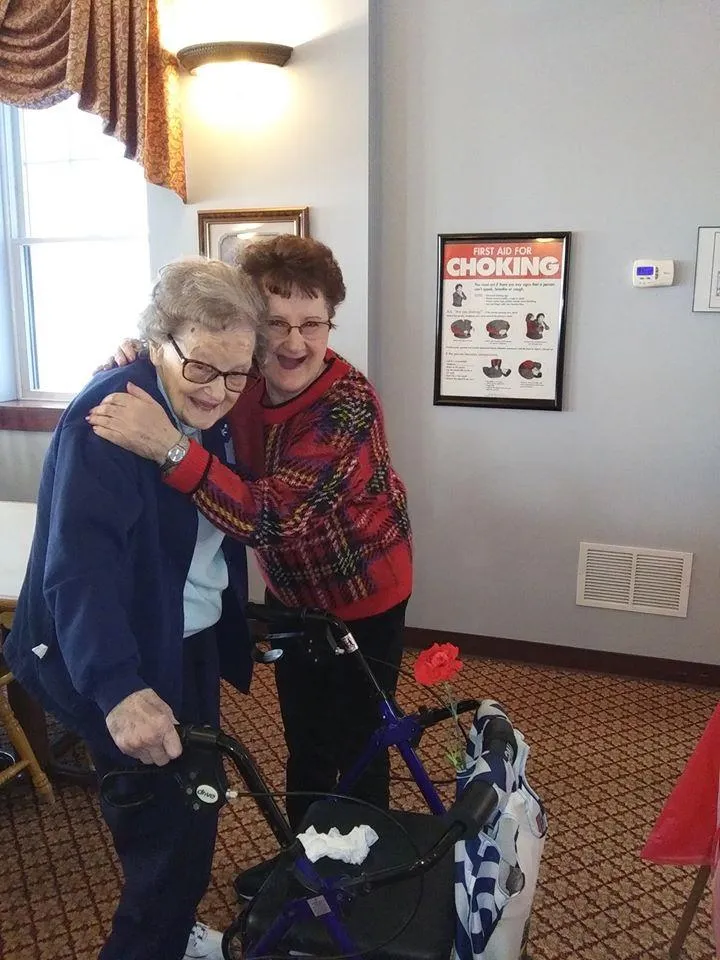 Residents enjoying a playful moment together in a common area