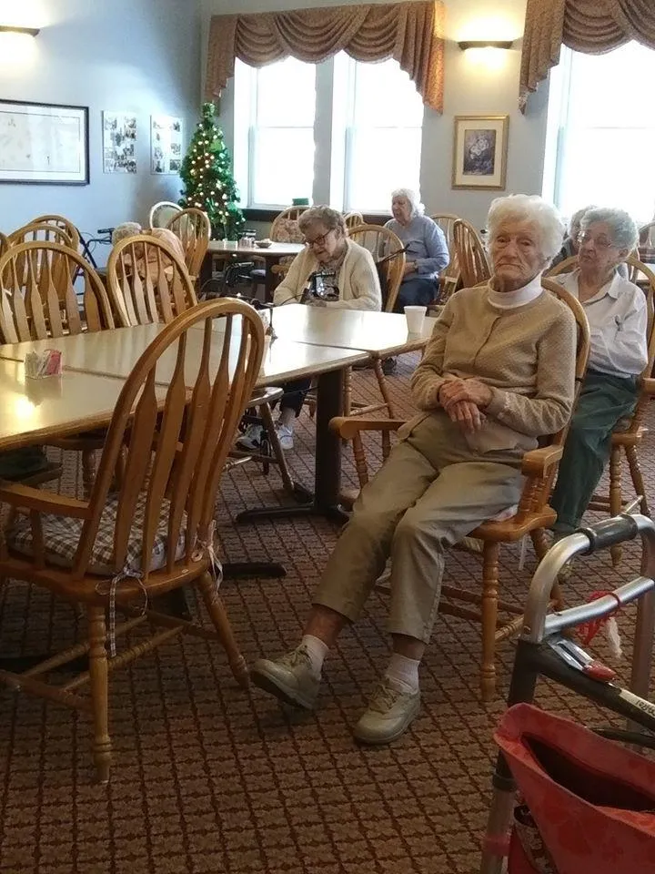 Residents relaxing in a common area during the holidays