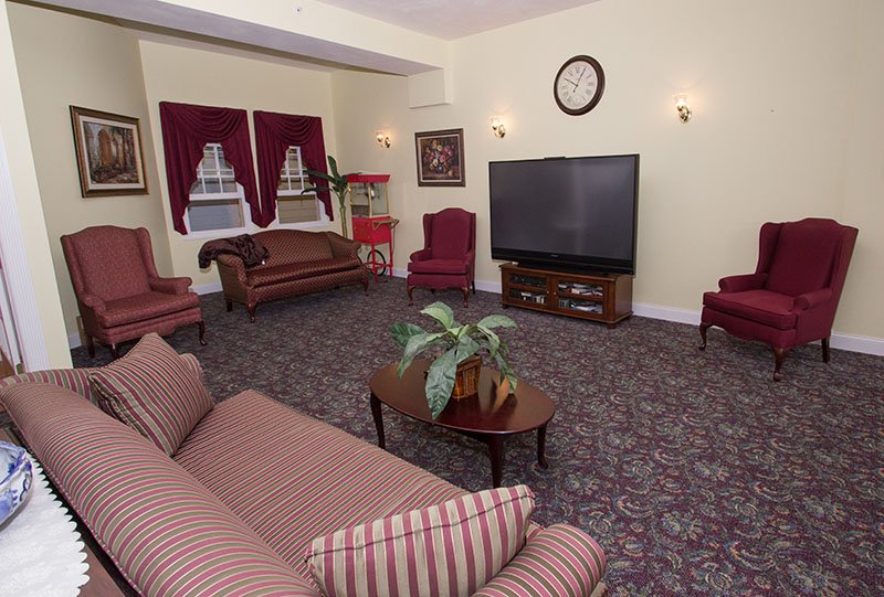 Cozy common area with seating and a television